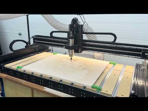 CNC hex pocket cut zoomed out — full board machining process